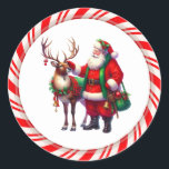 Santa Stickers Runt Klistermärke<br><div class="desc">Sticker shown with a cute Santa and candy cane print.  
Customize this item or buy as is.</div>