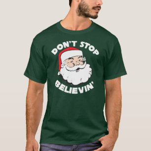 Santa stoppar inte Believin T skjortor Tee Shirt