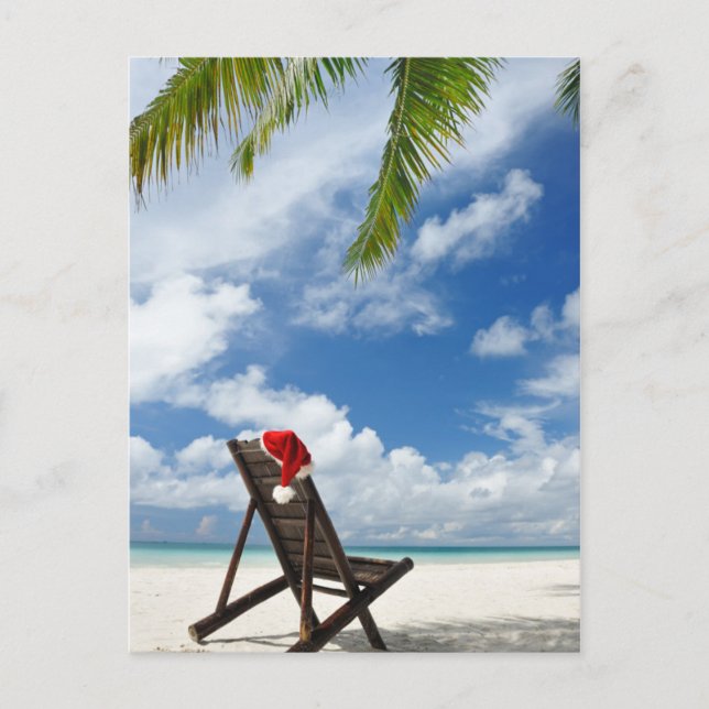Santas hatt och chaise varar slö på stranden helg vykort (Framsida)