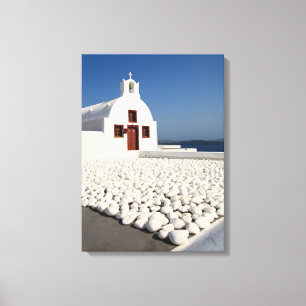 Santorini-kyrkan med vita stenar canvastryck