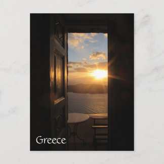 Santorini sunset genom dörren vykort