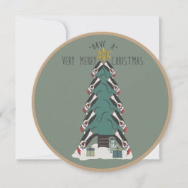 Särliga Penguins ligger runt Julgran Julkort