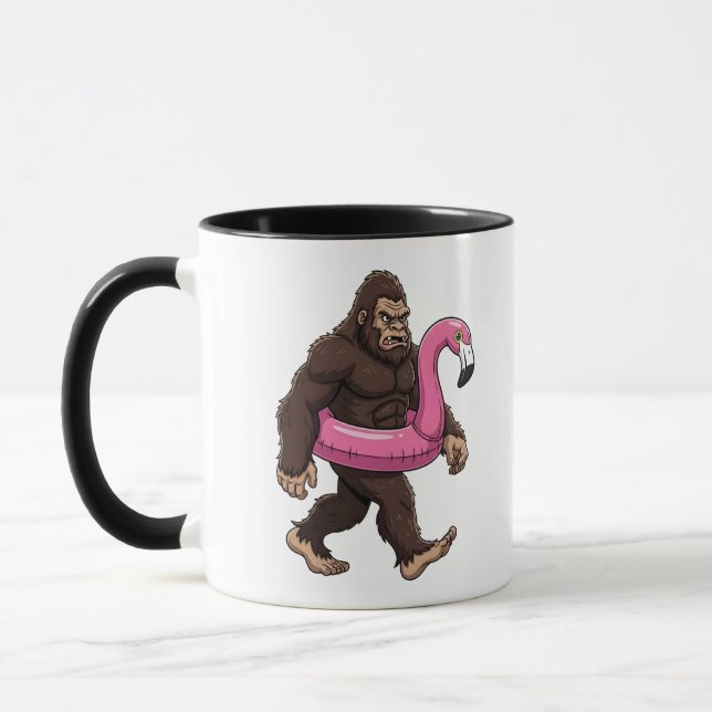 Sasquatch i en flamingoflotte Rolig kryptid sommar Mugg (Vänster)