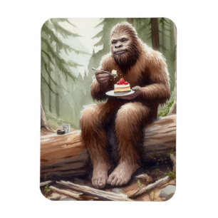 Sasquatch in mossy forest with a cheesecake magnet