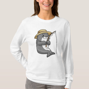 Säte vid fiske med fiskstav och fiskat t shirt