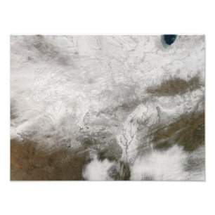 Satellit- beskåda av en sträng vinterstorm fototryck