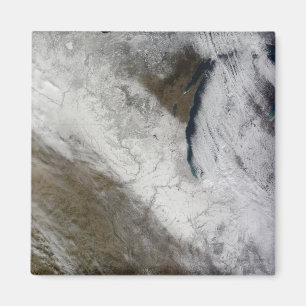 Satellit- beskåda av snö och kall magnet