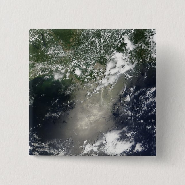 Satellitvy över påsar och rosett band av olja knapp (Framsida)