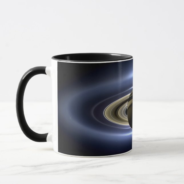 Saturnus. Jorden log Mugg (Vänster)