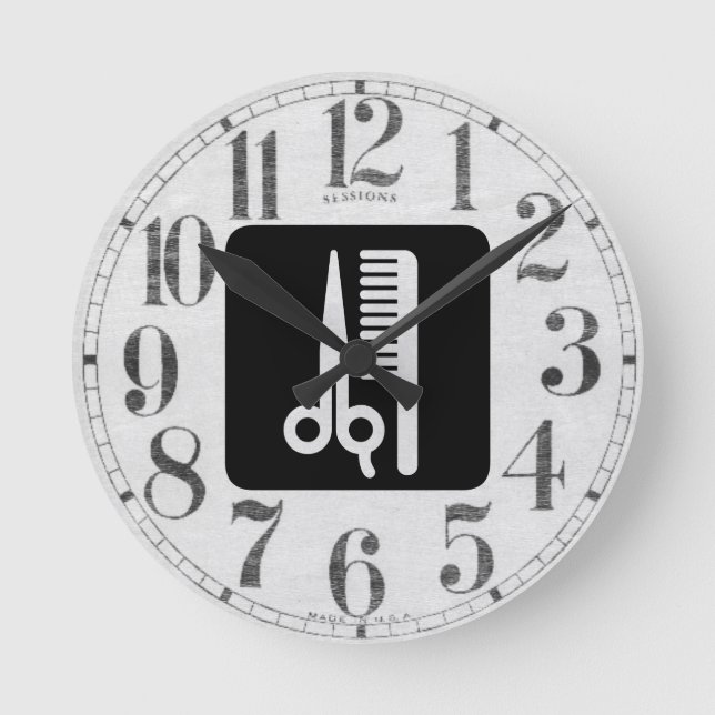 Sax och hårkam rund klocka (Framsida)