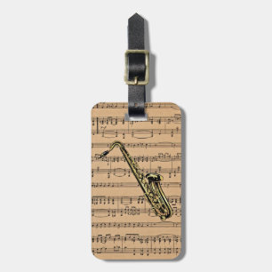 Saxofon~ med notbladbakgrund bagagebricka