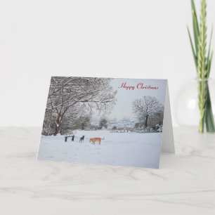 Scenlandskap i hund snö vid jul helgkort
