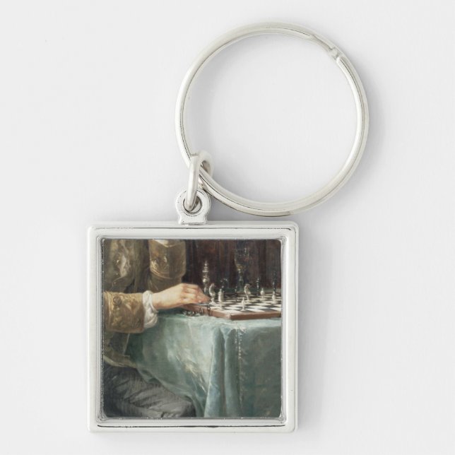 Schackspelarna, 1887 fyrkantig silverfärgad nyckelring (Framsidan)