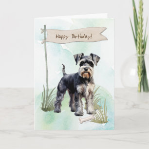 Schnauzer Hund aveln utomhus under födelsedagsskyl Kort