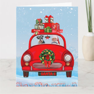 schnauzer Hund in bil with Jultomten Kort