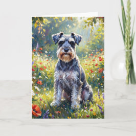 Schnauzer i äng med vilda blommor kort