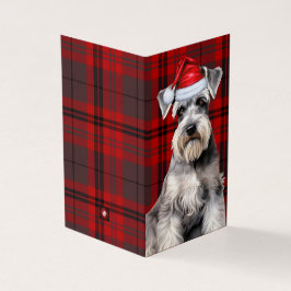 Schnauzer julhund med röd firanddräkt kort