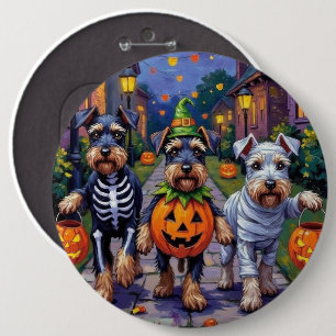 Schnauzer som söker godis på Halloween Knapp