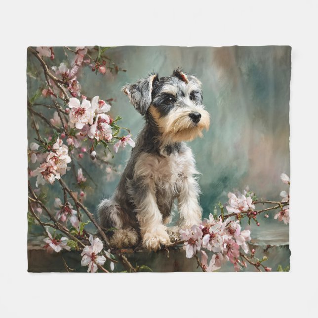 Schnauzer-valp bland vårens körsbärsblommor fleecefilt (Framsidan (Horisontell))