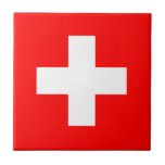 Schweiz Flagga Kakelplatta<br><div class="desc">Den schweiziska flagga är en kvadrat med kor i centrum. Den använda färgen i flagga är röd,  vit. Andelen schweiziska flagga är 1:1. Schweiz Flagga antogs 1889. Den första användan i den nuvarande flagga var 1470. Den senaste ändringen av den nuvarande utformningen av den schweiziska flagga gjordes 1841.</div>