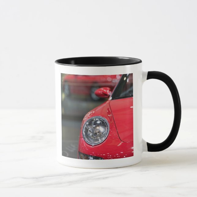 SCHWEIZ, GENEVA: 75:e årliga Genève Auto 8 Mugg (Höger)