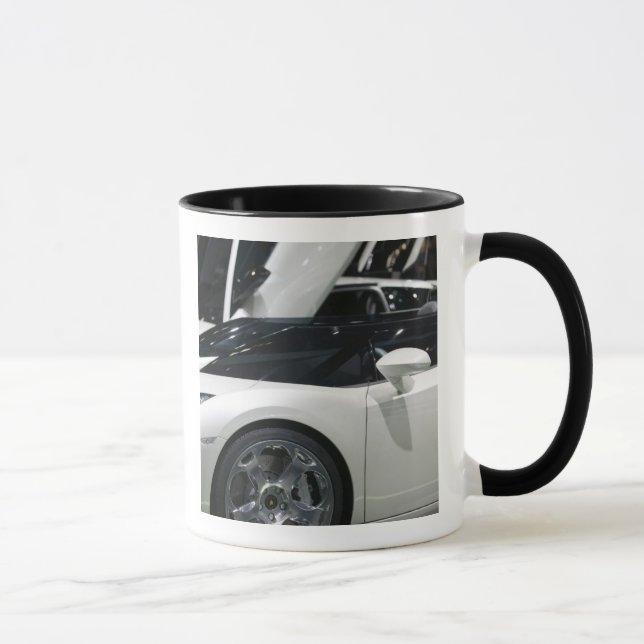 SCHWEIZ, GENEVA: 75:e årliga Genève Auto 9 Mugg (Höger)