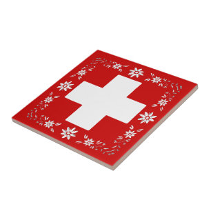 Schweizareflagga och edelweiss kakelplatta