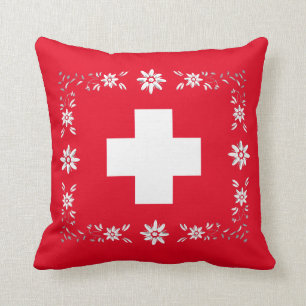 Schweizareflagga och edelweiss kudde