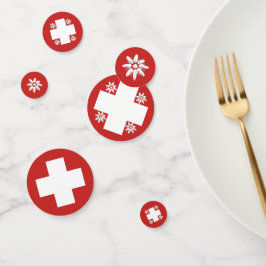 Schweizisk flagga och edelweiss