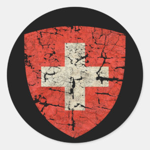 Schweizisk vapensköld som bedrövas runt klistermärke