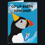 Scottish Birthday Co-là-breith sona dhut Puffin Hälsningskort<br><div class="desc">Co-là-breith sona dhut,  Grattis på födelsedagen hälsning i Scots Gaelic. En puffin och sill med födelsetal,  moln och vatten vågar,  finns på omslaget. Art,  bild och versell copyright © Shoaff Ballanger Studios,  2025.</div>