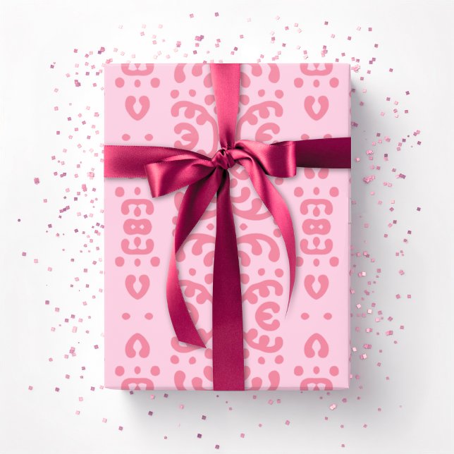 Scrollspets i rosa presentpapper (Skapare uppladdad)