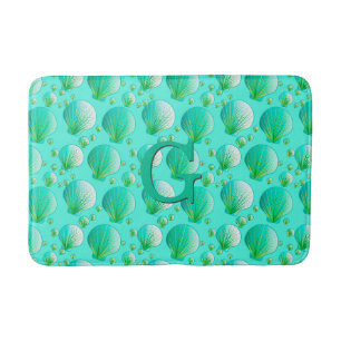 Seafoam gröna snäckskal på aqua badrumsmatta