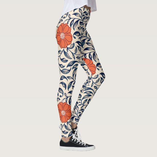 Seamless floral pattern with vibrant orange flower leggings (Höger)