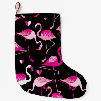 Seamless pattern from pink flamingos on a dark bac liten julstrumpa