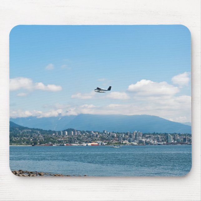 Seaplane som lyfter över Vancouver Bay Musmatta (Framsidan)