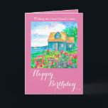 Seaside Cottage Grattis på födelsedagen Friend Kort<br><div class="desc">Ett hälsningskort från söt grattis på födelsedagen med en liten blå havsbeläggning med en segelbåt i vatten och en ljusröd söt ärter i blomning som minglar med lupiner och rosa vilda blommor en sommardag som dras med sepia bläck och målas med vattenfärg.</div>