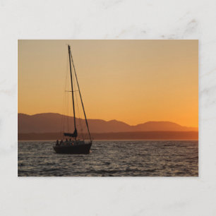 Segelbåt vid solnedgång på Puget Sound Vykort