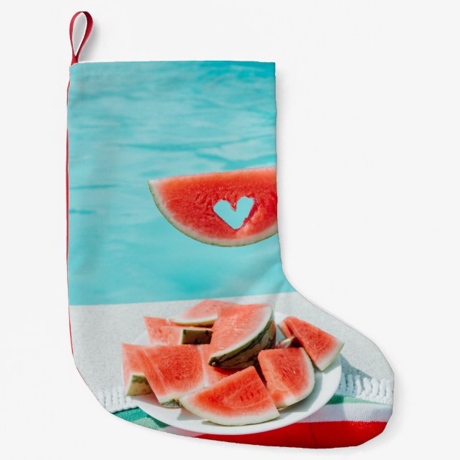 Segmenterad vattenmelon på vit papper liten julstrumpa (Framsidan)