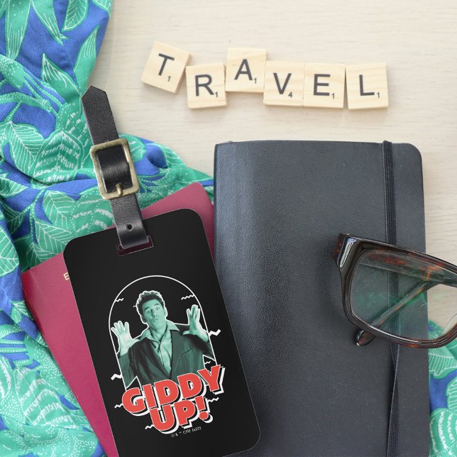 Seinfeld | Kramer - Giddy Up! Bagagebricka (Luggage tag on top of travel accessories)