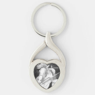 Senaste sväng twisted heart silverfärgad nyckelring