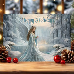 Serene Winter Angel-jul Helgkort<br><div class="desc">Julkortet i elegant har en serenvinter-ängel som står i en snöskog och symboliserar fred och ära under julhelgen. Med mjuka blues och skakande snö utstrålar den här designen lugn och lugn, och skapar den som ett vackert val för att skicka helgdag önskemål. Idealisk för alla som uppskattar julens innersta väsen...</div>