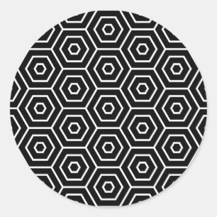 Sexhörningar texturerar det geometriska mönster runt klistermärke