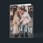 Shalom White Lettering Overlay Lycklig Hanukkah Helgkort<br><div class="desc">Lycklig Hanukkah! Skicka helgdag önskemål och hälsning till familj och vänner med det här fotokortet med helgdag "Shalom"-övertäckning. Anpassa genom att lägga till namn,  meddelande och foton. Den här designen är tillgänglig som ett platt kort,  ett vikat kort och ett vykort.</div>