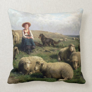 Shepherdess med får i en landskap kudde