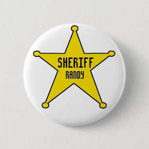 Sheriffemblem tillfogar namn knapp