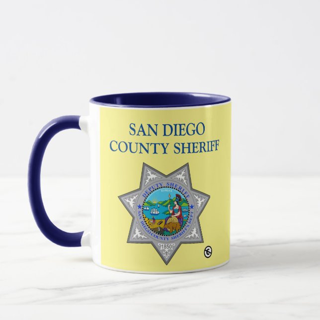 SheriffMugg i San Diego Mugg (Vänster)