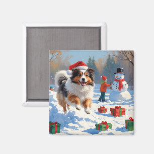 Shetland Sheepdog springar i snö med julhatt Magnet