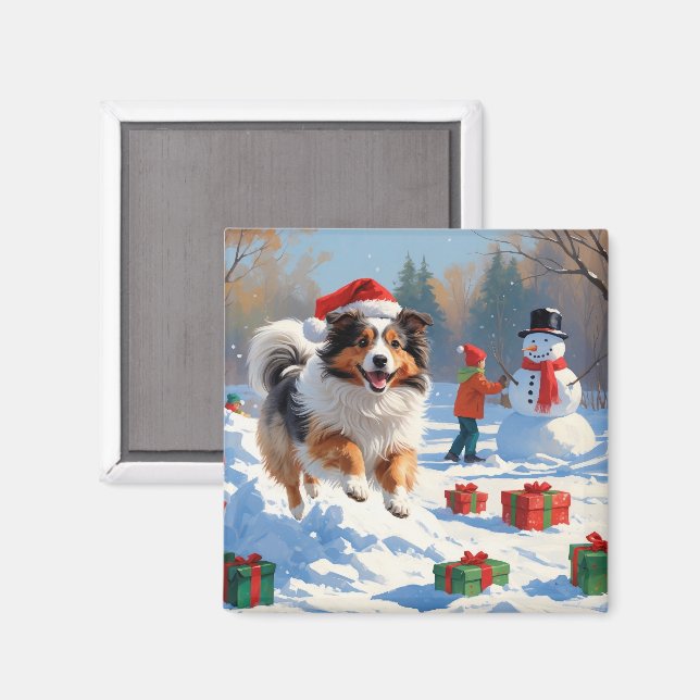 Shetland Sheepdog springar i snö med julhatt Magnet (Front/Back)