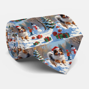 Shetland Sheepdog springar i snö med julhatt Slips